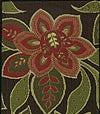 Strewn with deep-red flowers bordered by stylized leaves in shades of green and with cream highlights on a black-brown background.